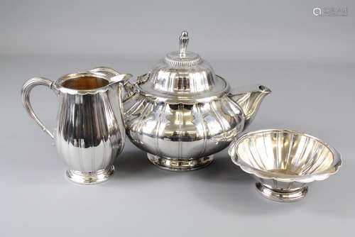 An Electro-plated Wurtemberg Metal Fabrik Tea Trio, comprising teapot with hinged cover, milk jug and sugar bowl c1920's