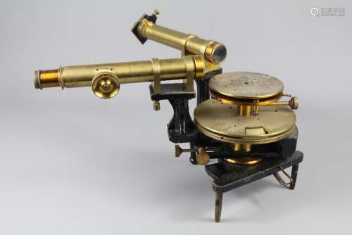 A Brass and Cast Iron Spectrometer with upper brass plate with dialing scale, two brass scopes resting on cast iron supports