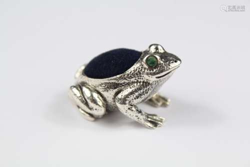 A Silver Frog Pin Cushion, with green enamel eyes, approx 3