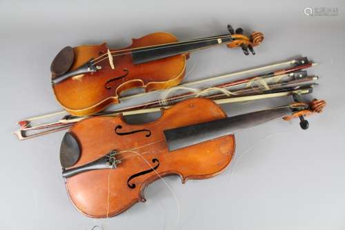 A Vintage Violin 35 cms, the violin in need of complete restoration, in the original case with three bows together with a child's violin approx 31 cms, also in need of restoration, in the original case