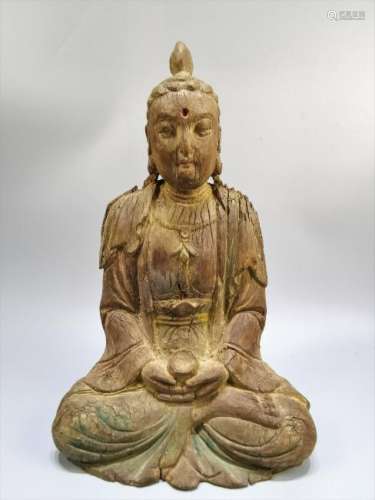 A CHINESE WOOD FIGURE OF GUANYIN, MING OR EARLIER