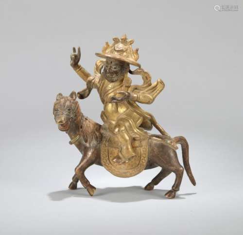 A CHINESE GILT BRONZE FIGURE JAMBHALA, QING DYNASTY