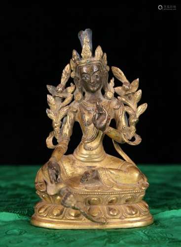 A CHINESE GILT BRONZE FIGURE OF GREEN TARA, QING