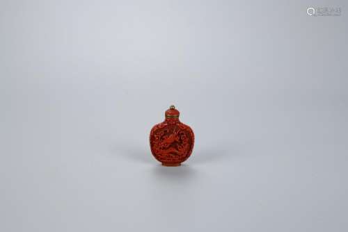 A CARVED LACQUER SNUFF BOTTLE, CHINESE QIANLONG MARK