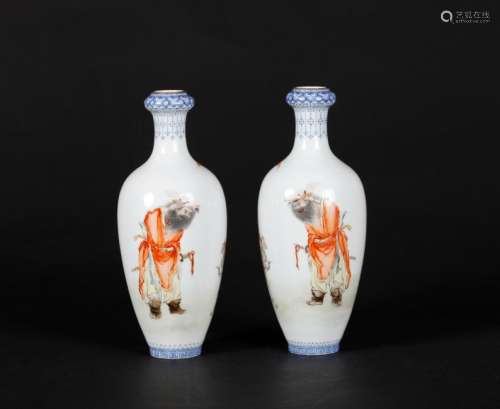 A PAIR OF CHINESE FAMILLE ROSE VASES, QIANLONG MARK BUT