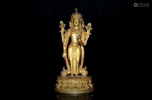 A CHINESE GILT BRONZE FIGURE OF GUANYIN, QING DYNASTY