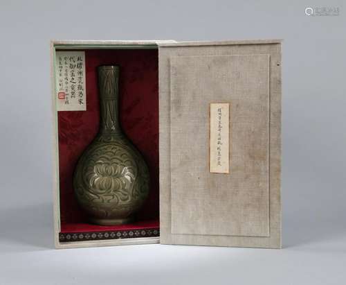 A CHINESE CARVED YAOZHOU 'PEONY' BOTTLE VASE, LABELED