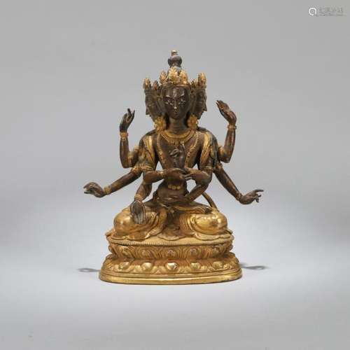 A CHINESE GILT BRONZE FIGURE, QING DYNASTY