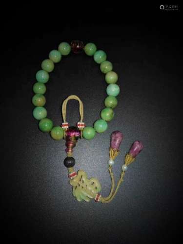 A JADEITE JADE BRACELET, QING DYNASTY