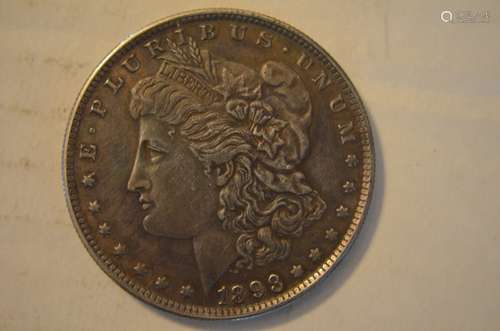 1893 S American Morgan silver coin.