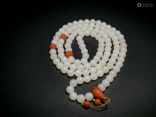 A WHITE JADE 108 BEADS NECKLACE.