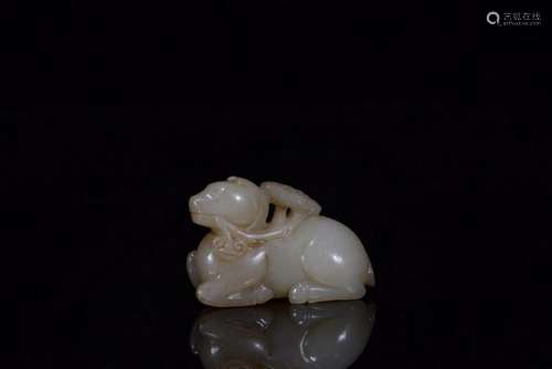 A CARVED WHITE JADE GOAT.QING PERIOD