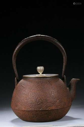 A JAPANSES CARVED IRON TEAPOT AND COVER.ANTIQUE