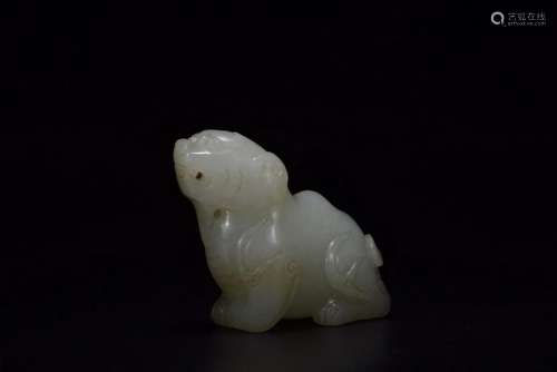 A CARVED WHITE JADE BEAST.QING PERIOD