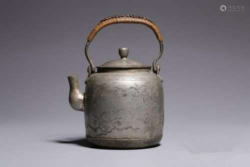 A CARVED JAPANESE SILVER TEAPOT AND COVER.ANTIQUE