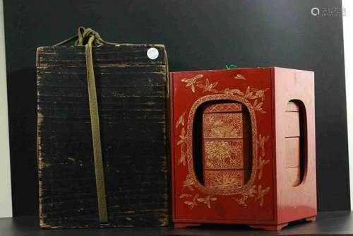 A JAPANESE RED-LACQUER BOX AND COVER.