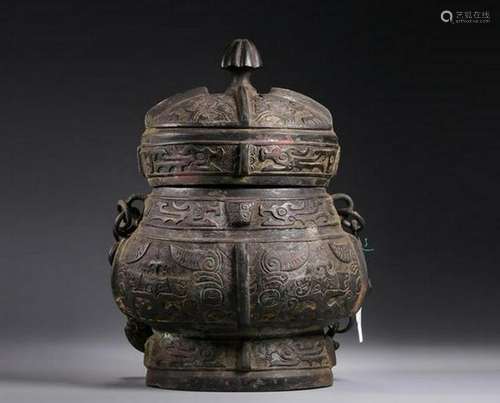 A BRONZE RITUAL WINE VESSEL.ANTIQUE