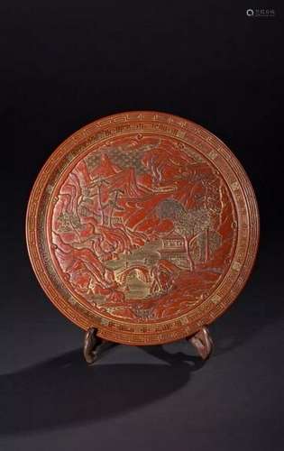 A RED-LACQUER 'LANDSCAPE' DISH.ANTIQUE