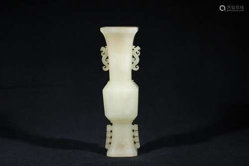 A CARVED WHITE JADE VASE.GU.QING PERIOD