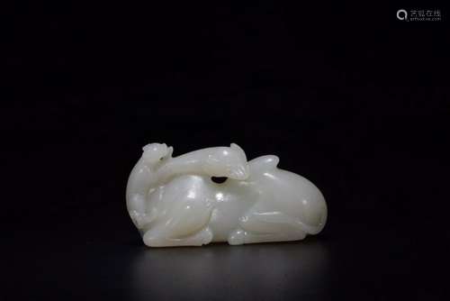 A CARVED WHITE JADE 'BEAST' GROUP.QING PERIOD