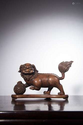 A CARVED HUANGYANGMU LION.QING PERIOD