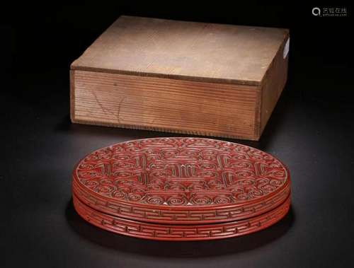 A CINNABAR LACQUER BOX AND OCVER.MING PERIOD