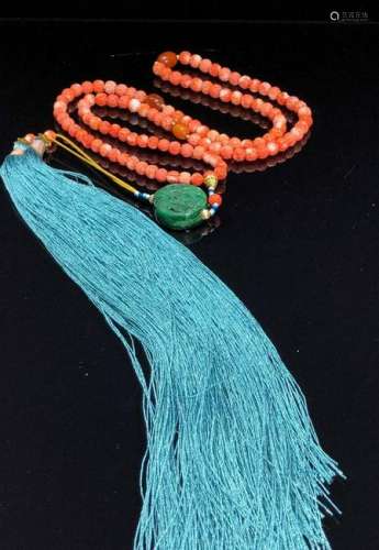 A RED CORAL 108 BEADS NECKLACE.