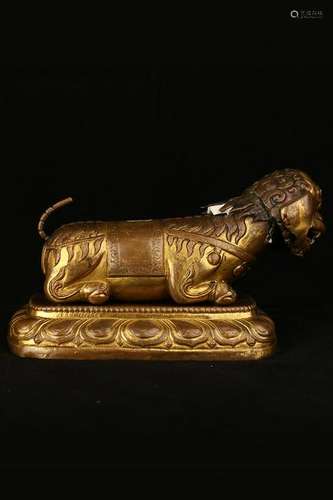 A  GILT-BRONZE FIGURE OF LION.QING PERIOD