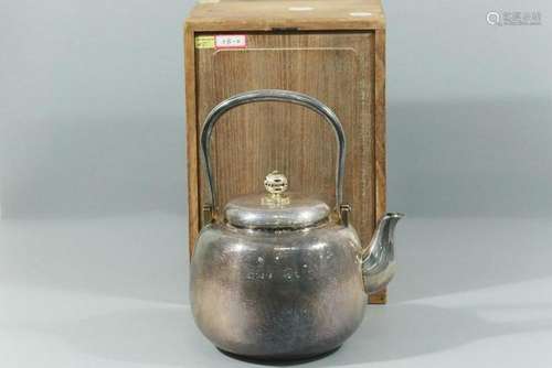 A JAPANESE SILVER TEAPOT AND COVER.ANTIQUE