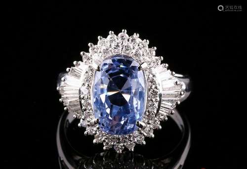 A WHITE-GOLD AND DIAMOND SAPPHIRE RING.