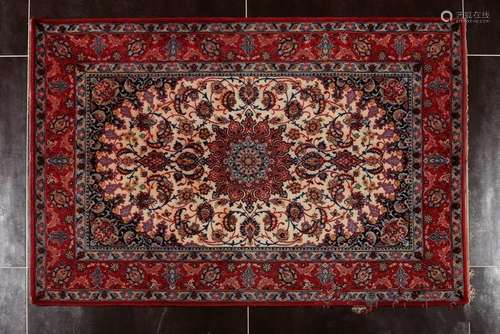 A RED SILK THREAD CARPET.REPUBLIC PERIOD