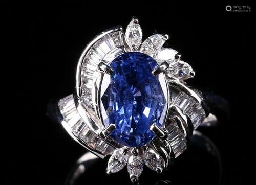 A WHITE-GOLD AND DIAMOND SAPPHIRE RING.