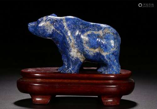 A CARVED LAPIS LAZUL BEAR GROUP.