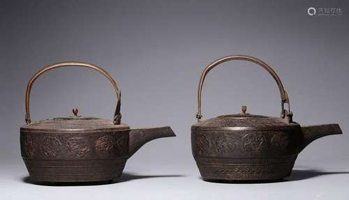 TWO OF CARVED JAPANESE IRON TEAPOT AND COVERS.ANTIQUE