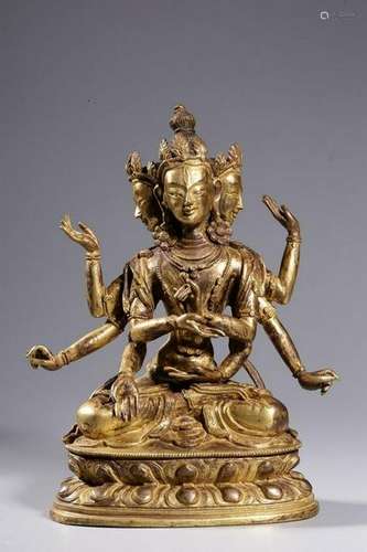 A GILT-BRONZE FIGURE OF GUANYIN.QING PERIOD