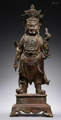 A BRONZE FIGURE OF VAISRVANA.MING PERIOD