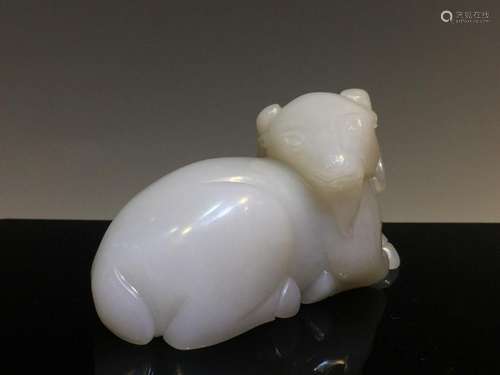 A CARVED WHITE JADE BUFFALO.ANTIQUE