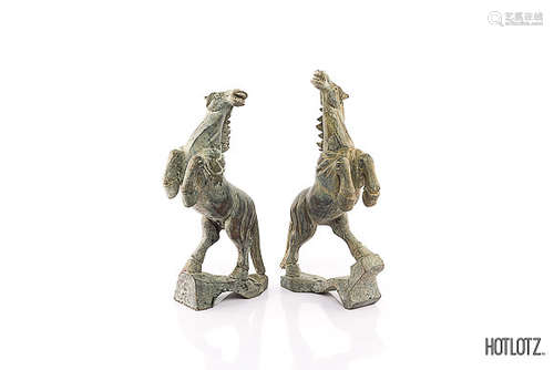 A PAIR OF CHINESE CARVED STONE HORSES