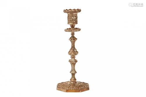 AN ANTIQUE SILVER ALLOY CANDLE HOLDER