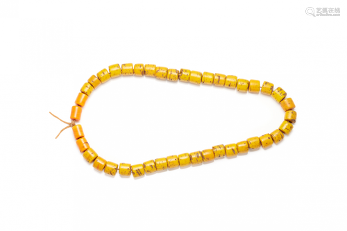 42 ANTIQUE INDIAN YELLOW AND ORANGE GLASS BEADS