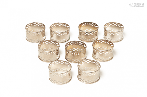 NINE SILVER PLATED NAPKIN RINGS