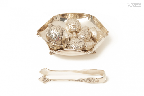 A SET OF SILVER FRUITS AND NUTS IN A BOWL WITH TONGS