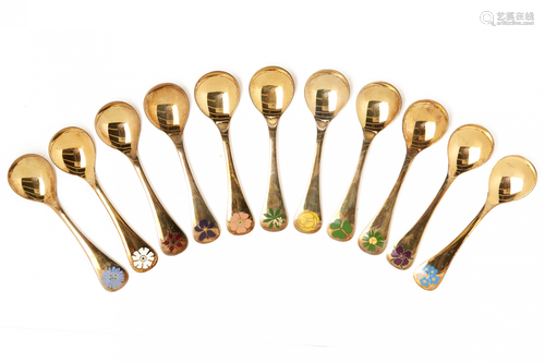 GEORG JENSEN - A SET OF ELEVEN VINTAGE SILVER-GILT 'GLOBE FLOWER' SPOONS