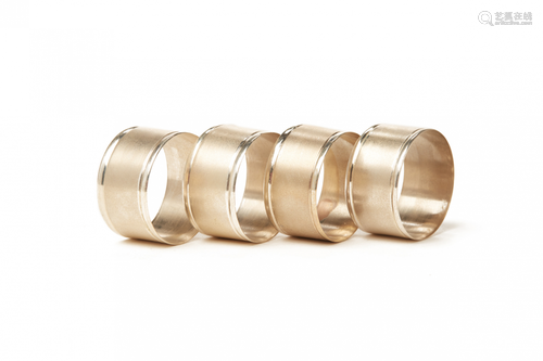 FOUR SILVER NAPKIN RINGS