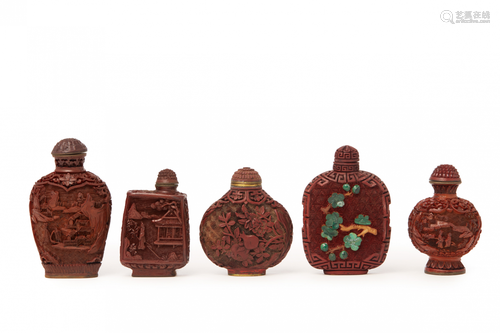 A COLLECTION OF FIVE CARVED CINNABAR SNUFF BOTTLES