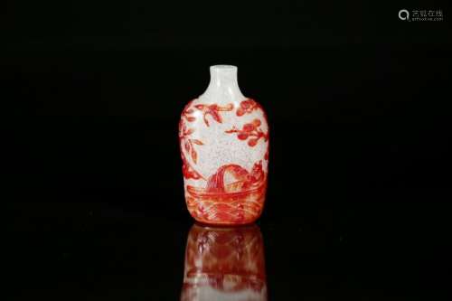 A carved red glass overlay snuff bottle