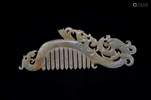 A greenish jade toothed animal mark ornament