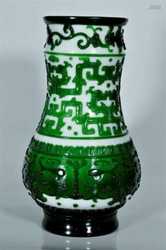 A carved green glass overlay