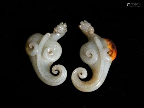 A pair of white jade 'chi-dragon'