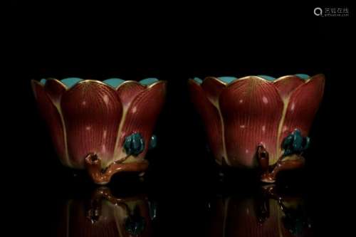 A pair of ruby-ground famille-rose magnolia cup